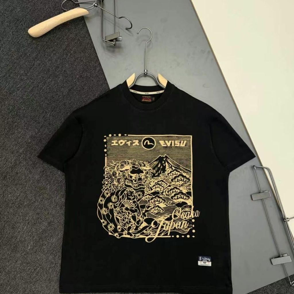 EVC สไตล์ใหม่ Street Wear Mens Trademark รูปแบบพิมพ์ลําลองหลวมรอบคอแขนสั้นเสื้อยืดคู่ด้านบน