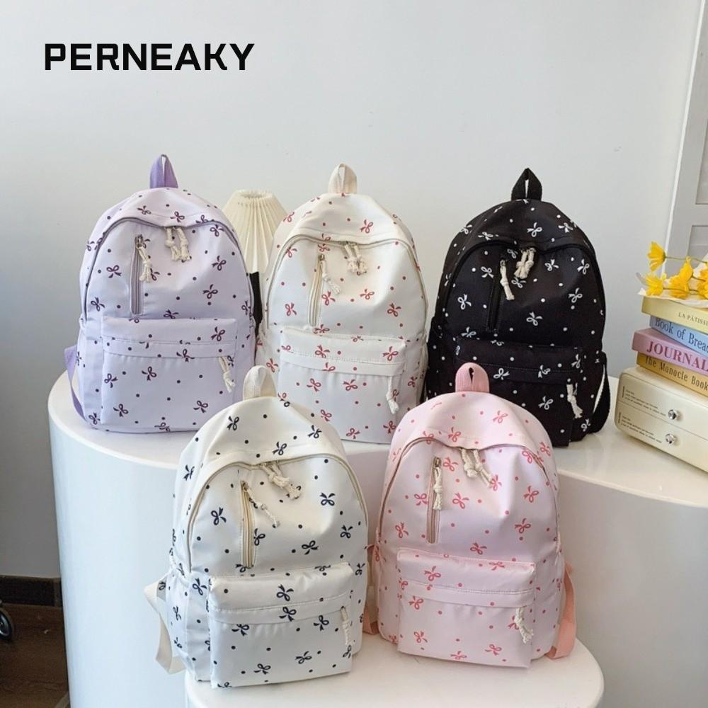 กระเป๋าเป้ PERNEAKY สำหรับนักเรียน สายปรับระดับได้ พิมพ์ลายโบว์ ขนาดใหญ่พิเศษ ทำจากไนลอน ออกแบบมาพร้อมช่องเก็บของมากมาย เหมาะสำหรับใช้งานทุกวัน