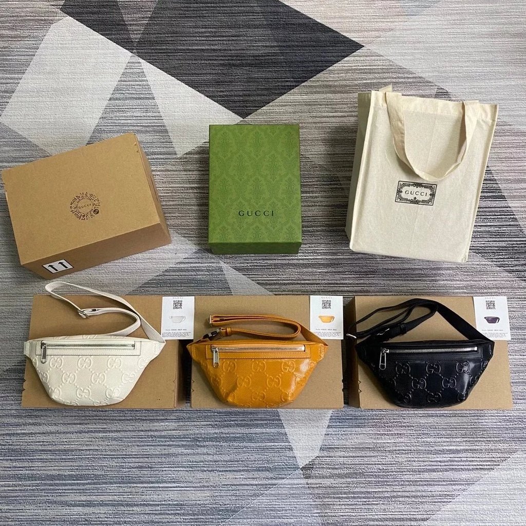 CNZX Gucci/Gucci 2021 กระเป๋าผู้ชายสไตล์ใหม่ GG พิมพ์นูนเอวกระเป๋ากระเป๋าหน้าอกกระเป๋าสะพายกระเป๋า M