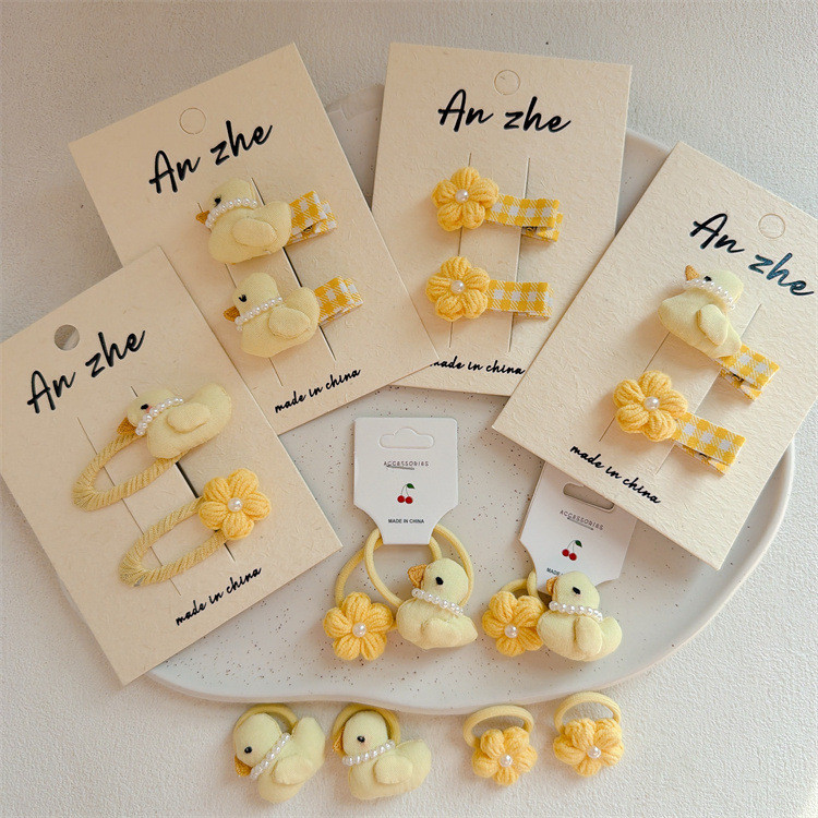 กิ๊บติดผมลายดอกไม้และเป็ดการ์ตูน สี.YELLOW. น่ารัก เหมาะสำหรับเด็กผู้หญิง