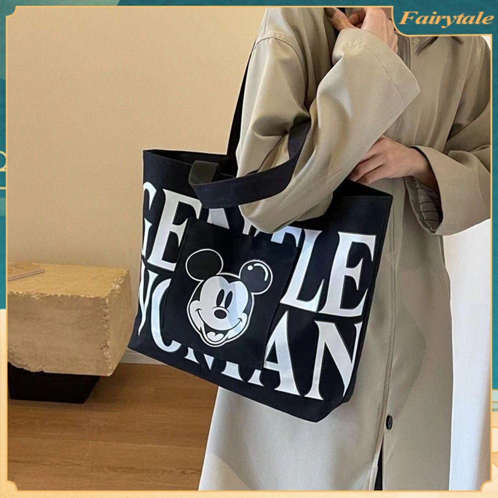 ❀ พร้อมส่ง: กระเป๋าผ้าแคนวาสสำหรับผู้หญิง ลายมิกกี้เมาส์ ดีไซน์น่ารัก ผ้าหนาคุณภาพดี สีกระเป๋า: ดำ ขาว ฟ้า (M-070)