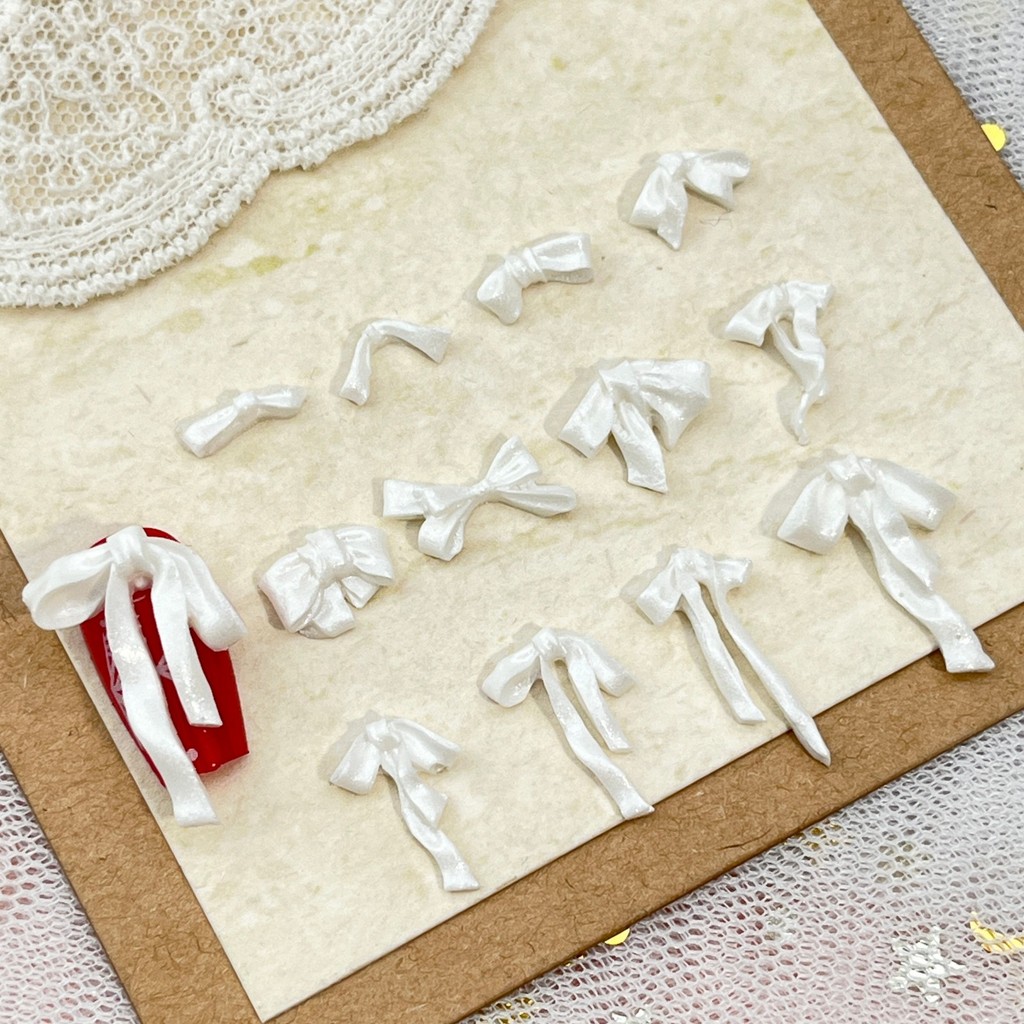 ใหม่นุ่มแกะสลัก Bowknot อุปกรณ์แต่งเล็บ All-Match Pearl White ซาตินริบบิ้น Bow Tie เรซิ่น diy อุปกรณ์ทําเล็บ ราคา ถูกที่สุด ดีลบีเคเค แกลเลอรีภาพที่ 4