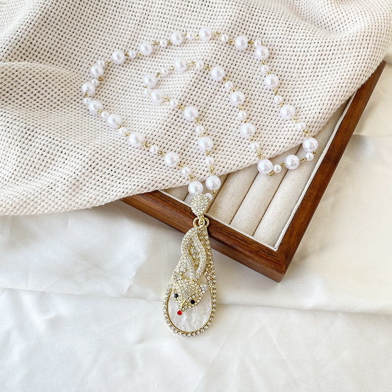 เสื้อกันหนาวยาวสไตล์หรูหราพร้อมสร้อยไข่มุกและจี้ #MYL0115