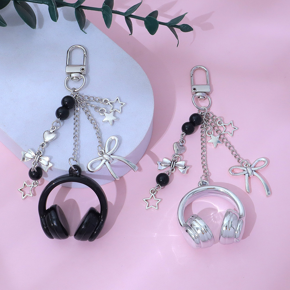 Punk Silver สีชุดหูฟังพวงกุญแจแฟชั่นโลหะ Bowknot Star จี้ Key Holder ผู้หญิงกระเป๋าถือเครื่องประดับ