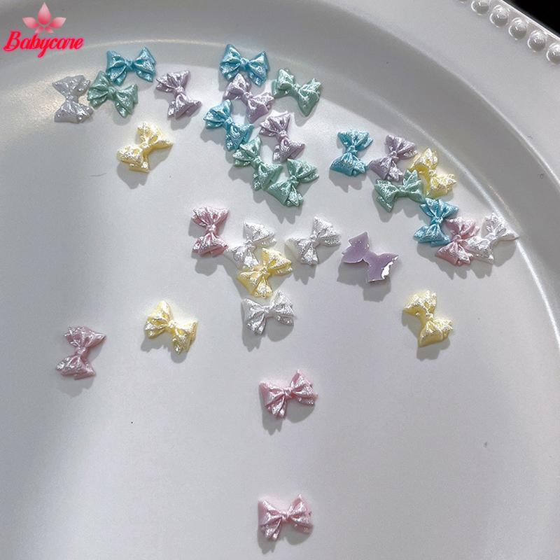 <BYCE-t> 50PCS Pearlescent 3D เล็บโบว์ Charm สําหรับเล็บตกแต่งออกแบบ Kawaii เล็บเครื่องมือ Bow-knot DIY Craft Supplies ราคา ถูกที่สุด ดีลบีเคเค แกลเลอรีภาพที่ 4