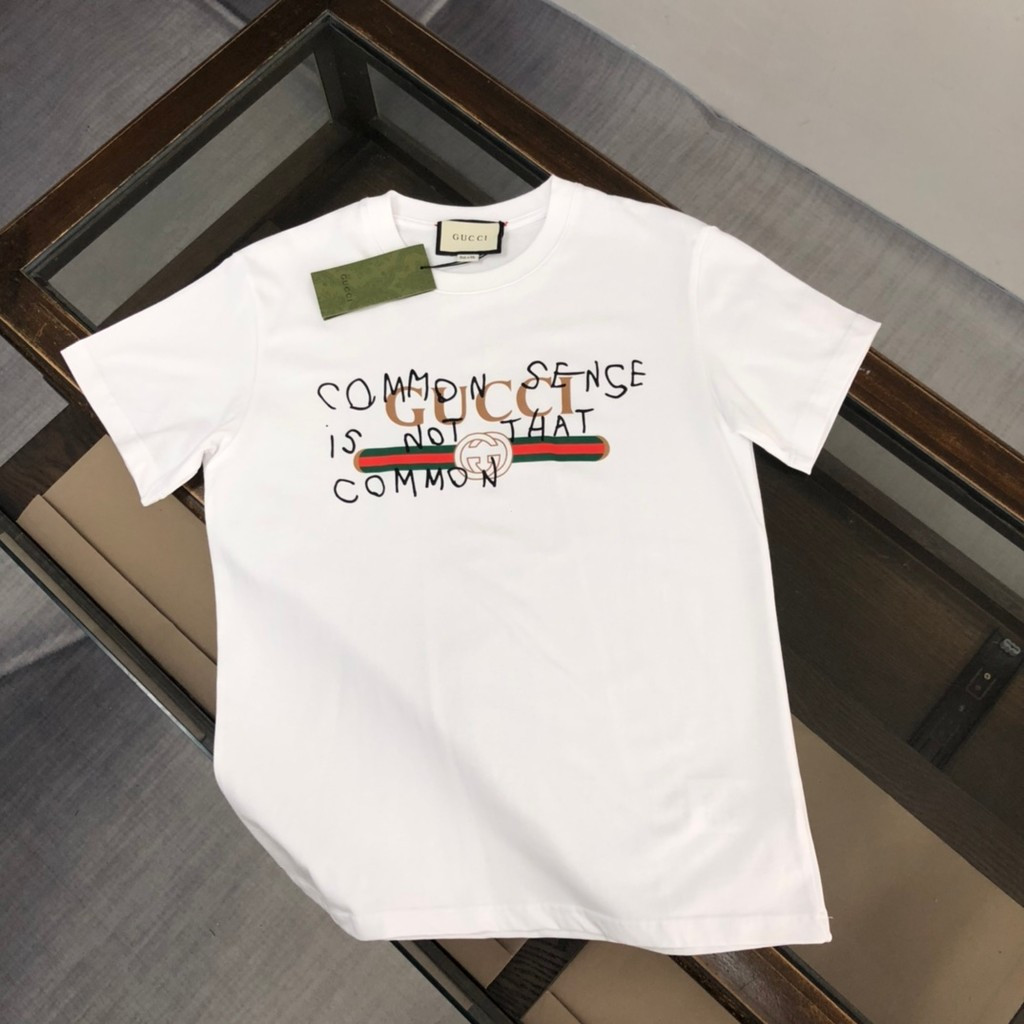 กุชชี่/กุชชี่2026คลาสสิกรอบคอแขนสั้นเสื้อยืดผู้ชายผู้หญิงฤดูใบไม้ร่วงเสื้อผ้าเสื้อสวมหัว2026ต้นฤดูใบ