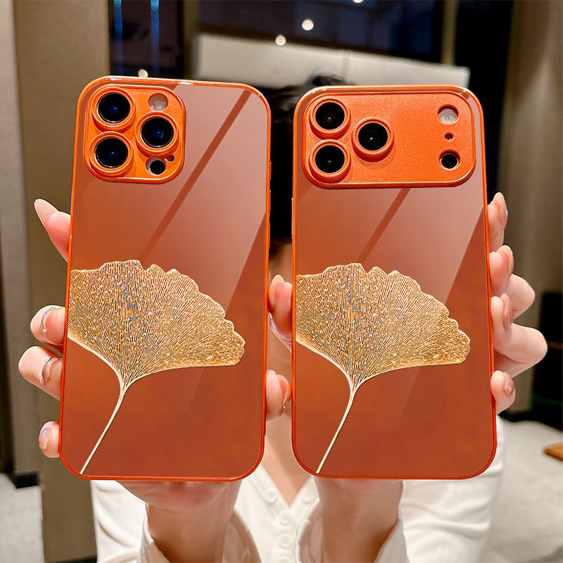 ใบแปะก๊วยสีส้มเหมาะสําหรับ 17 เคสโทรศัพท์กระจกนิรภัย iPhone16promax เคสป้องกัน 15Pplus