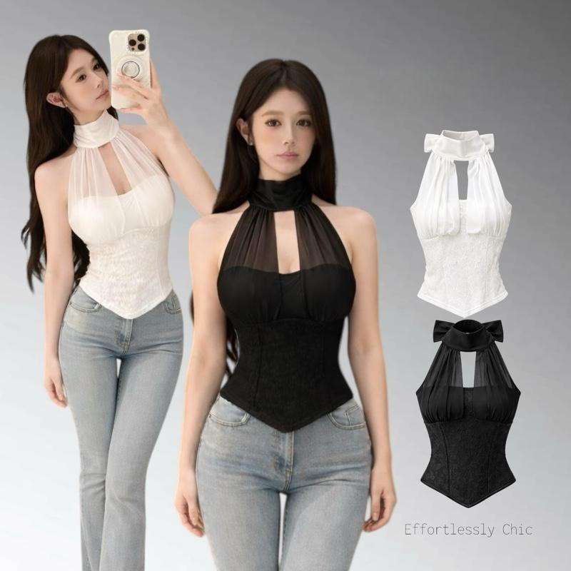 เสื้อสายเดี่ยวลูกไม้เปิดหลังตัวนี้ดูหรูหราและสง่างาม ด้วยทรงเข้ารูปที่เน้นช่วงเอวและเผยให้เห็นสัดส่วนที่สวยงามของแผ่นหลั