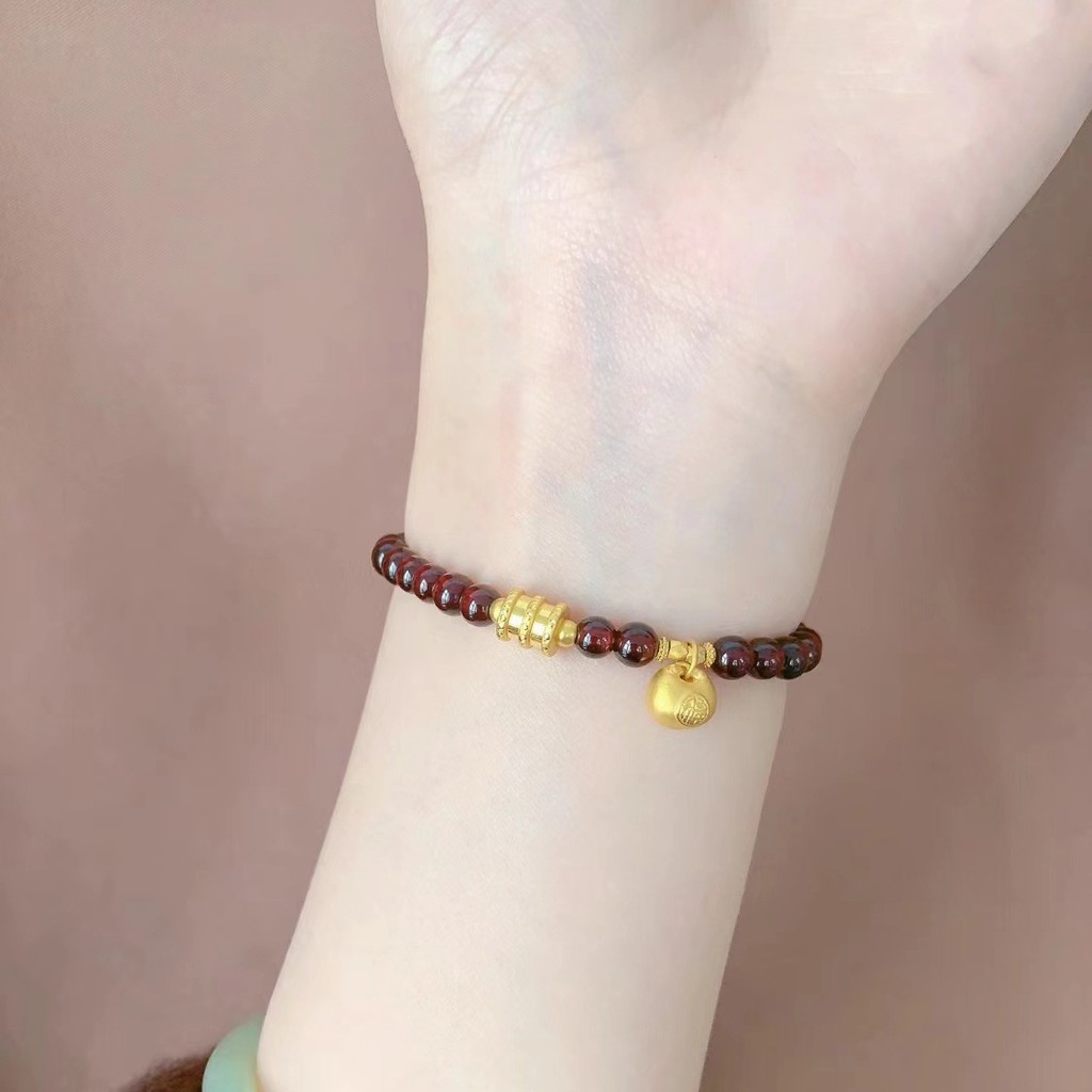 สร้อยข้อมือนำโชคสีโกเมน จี้ถุงทองและลูกปัดเอวเล็กมงคล สร้อยข้อมือแฟชั่นสตรี เรียบหรูมินิมอลเซน