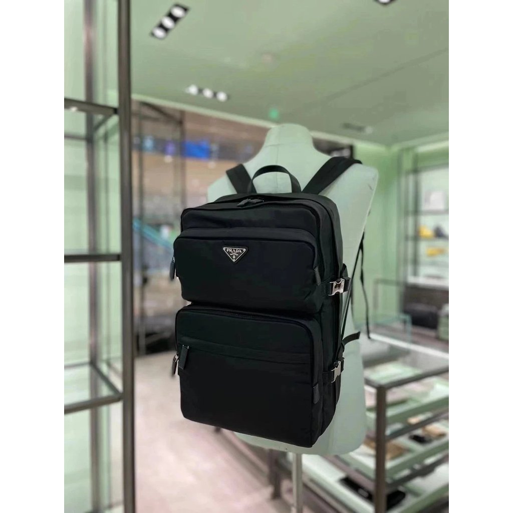 ปราด้า ผู้ชายสไตล์ใหม่กระเป๋าเป้สะพายหลังไนลอนกระเป๋าเป้สะพายหลังมัลติฟังก์ชั่กระเป๋าดัฟเฟิลเต็มรูปแ