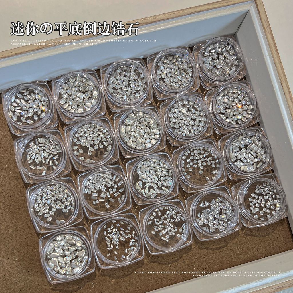 มินิคริสตัลเพชรตกแต่งเล็บ ทรงคละแบบ ตลับกลม (Mini Flat Back Zircon Nail Charm)