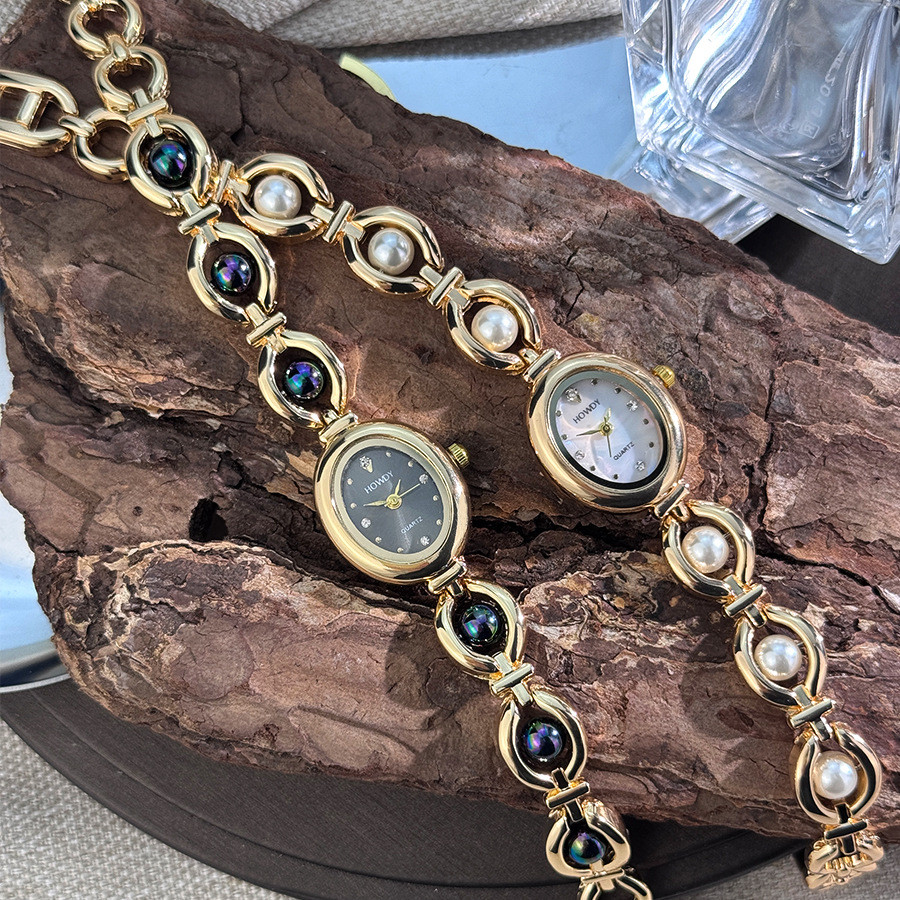 High-End Retro เลียนแบบ Pearl นาฬิกาสุภาพสตรี Chanel หรูหราสร้อยข้อมือนาฬิการูปไข่นาฬิกา Classy หญิง
