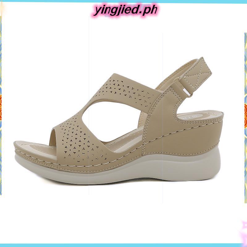 2025 ฤดูใบไม้ผลิฤดูร้อนสไตล์ใหม่แฟชั่นสไตล์ Casu al Hollow Upper Wedge Heel รองเท้าแตะชายหาดกลางแจ้ง