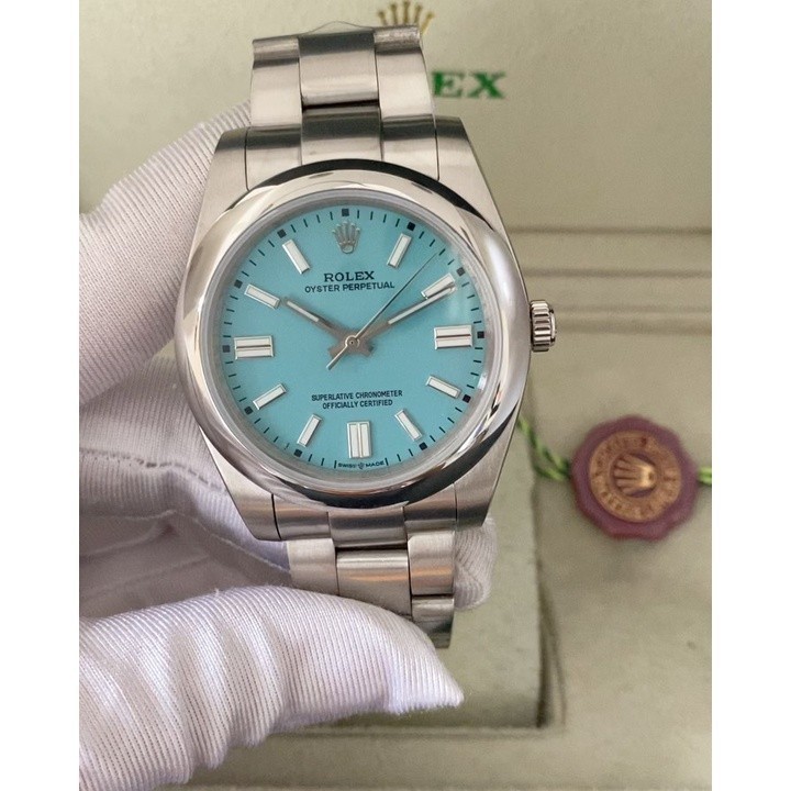 นาฬิกาผู้ชาย Rolex OYSTER PERPETUAL พื้นหลังสีน้ําเงินสีเงิน