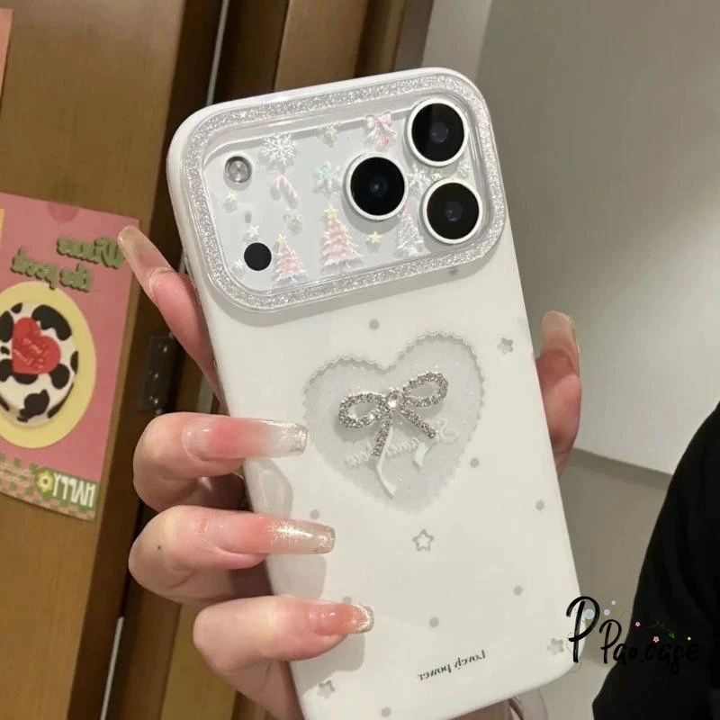 เคสไอโฟน13 16 17เคสชิมเมอร์หัวใจโบว์ป้องกันสงกรานต์ สำหรับ IPhone 17 16 12 13 15 11 14 Pro Max XR X XS 7 8 16 15 14 Plus