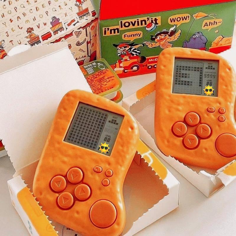 คอนโซลเกม Tetris สไตล์เดียวกันของ McDonald McDonalds Fun คอนโซลเกมคลายการบีบอัดเพื่อการศึกษาของเล่นเด็ก