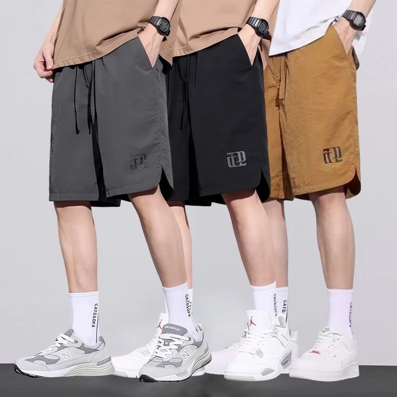 กางเกงขาสั้นผู้ชายแฟชั่นเกาหลีกีฬาเอวยางยืดสามสีตัวเลือก