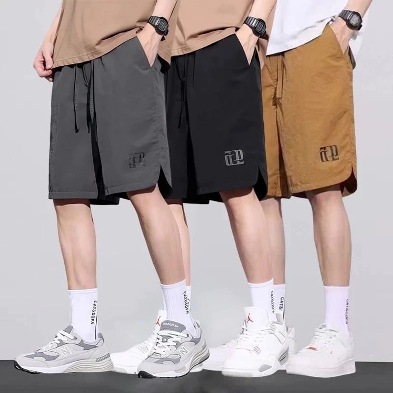 กางเกงขาสั้นผู้ชายแฟชั่นเกาหลีกีฬาเอวยางยืดสามสีตัวเลือก