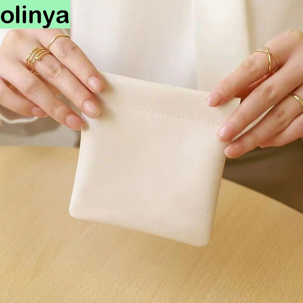 OLINYA กระเป๋าแต่งหน้าลิปสติก ขนาดเล็กแบบพกพา PU สําหรับเดินทาง พร้อมพวงกุญแจ ใส่เครื่องสําอางผู้หญิง
