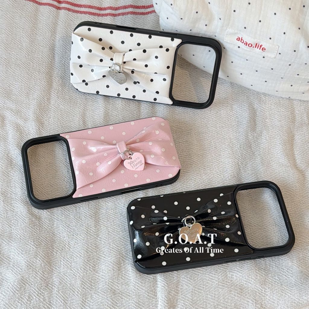 GOAT ปลอกสายรัดข้อมือรูปโบว์หนังลายจุดเรียบง่ายสําหรับ iPhone 17 PRO MAX iPhone 17 16 14 13 15 PRO MAX Anti-Fall ป้องกันปกหลัง