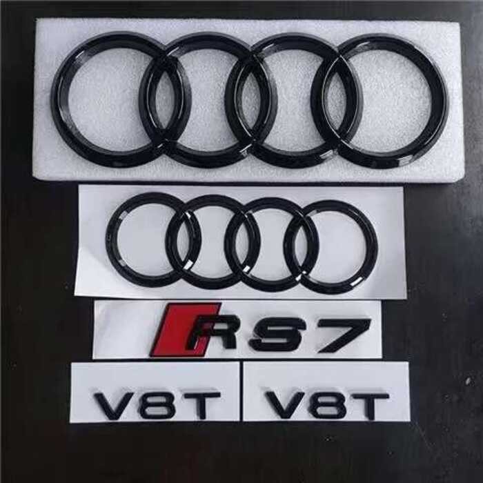 ▥ AUDI Rs7 4-แหวนโลโก้absสีดํารถhoodด้านหน้าย่างสัญลักษณ์ด้านหลังป้ายสติกเกอร์rs7 สัญลักษณ์v8tส