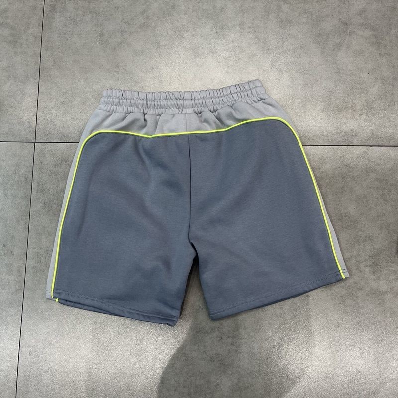 SYNA WORLD โลโก้ขนาดเล็กเย็บปักถักร้อยโลโก้ Spliced กางเกงขาสั้นเจาะ Street Hip-hop กางเกงลําลองอินเ