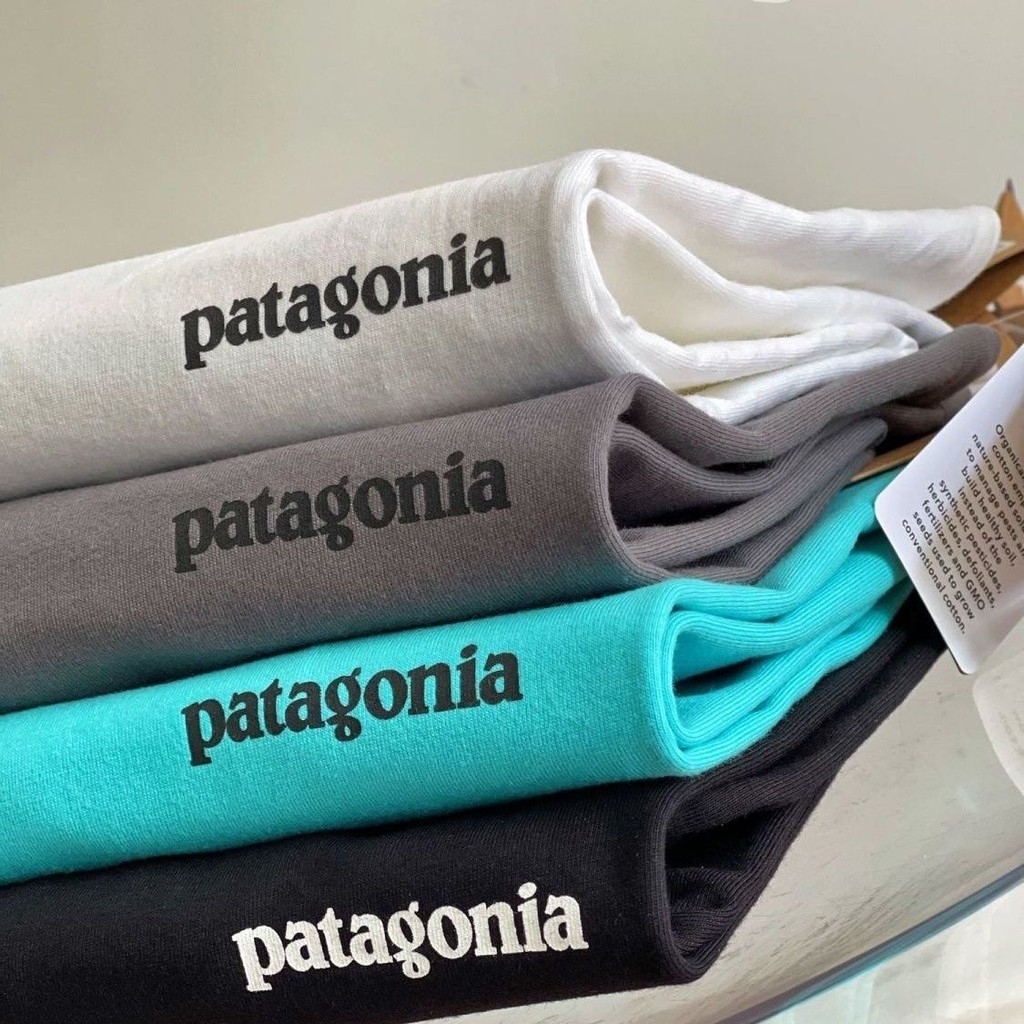 American Patagonia Small-label Patagonia เสื้อยืดแขนสั้นผ้าฝ้ายแท้สําหรับผู้ชายและผู้หญิงพิมพ์หลวม