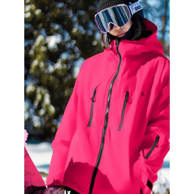 เสื้อแจ็คเก็ตสกีสีชมพูเรืองแสง ยางรีดเต็มที่ 3 ลิตร พร้อมกำมะหยี่กันน้ำ กันลม อบอุ่น และทนต่อการสึก