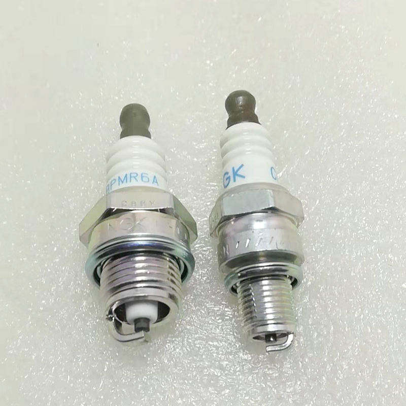 Ngk Spark Plug BM6A BPMR6A Two-Stroke เครื่องตัดหญ้าเลื่อยโซ่ Hedge Machine Mist Machine 14 ซม. ฟันส