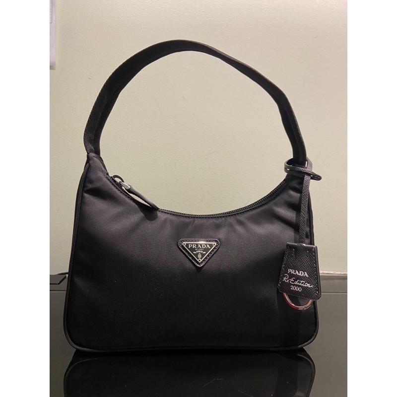 ♞,♘ถูกที่สุด ของแท้ 100% Prada Re edition 2000