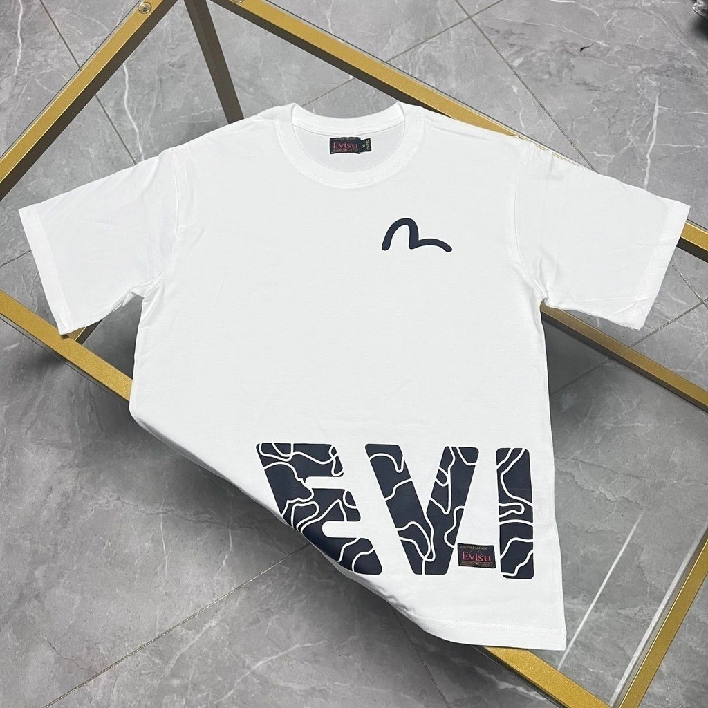 เสื้อยืดผ้าฝ้ายแท้สไตล์เดียวกันของ Evisu Fushen ผู้ชายและผู้หญิงพร้อมปั๊มร้อนตัวอักษรพิมพ์ Casu