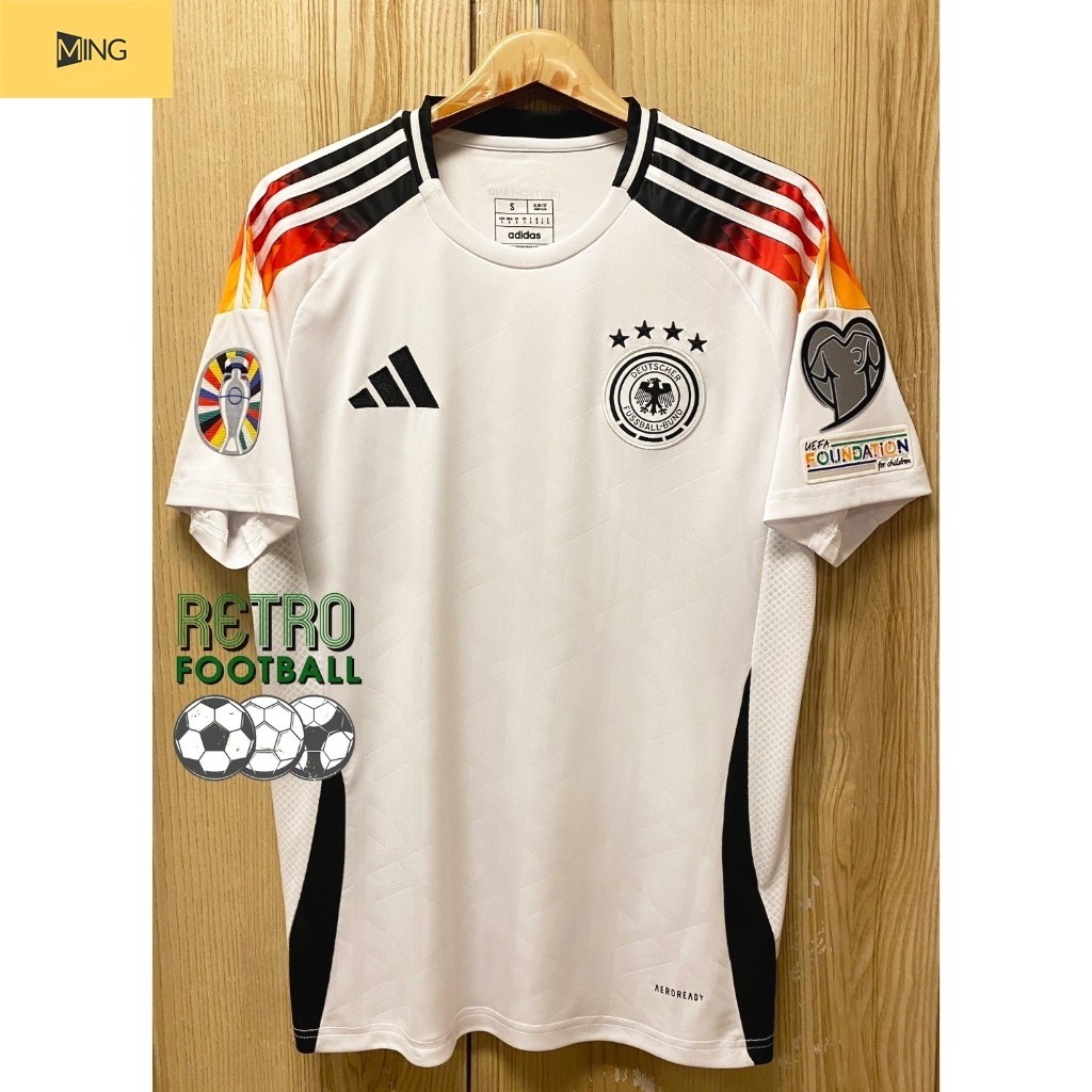 MING  เสื้อฟุตบอล ทีมชาติเยอรมัน Home ชุดเหย้า ยูโร 2024 เกรดแฟนบอล [ 3A ] สีขาว เสื้อเปล่าพร้อมอาร์ม ยูโร 2ข้าง
