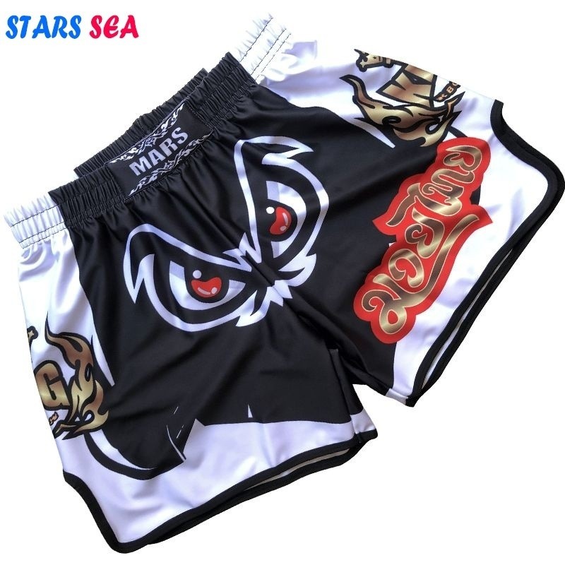 กางเกงมวยไทยสำหรับผู้ชายและผู้หญิง อุปกรณ์เสริมสำหรับการฝึกอบรมและการต่อสู้ เหมาะกับเสื้อกันเหงื่อและกางเกงยืดหยุ่น