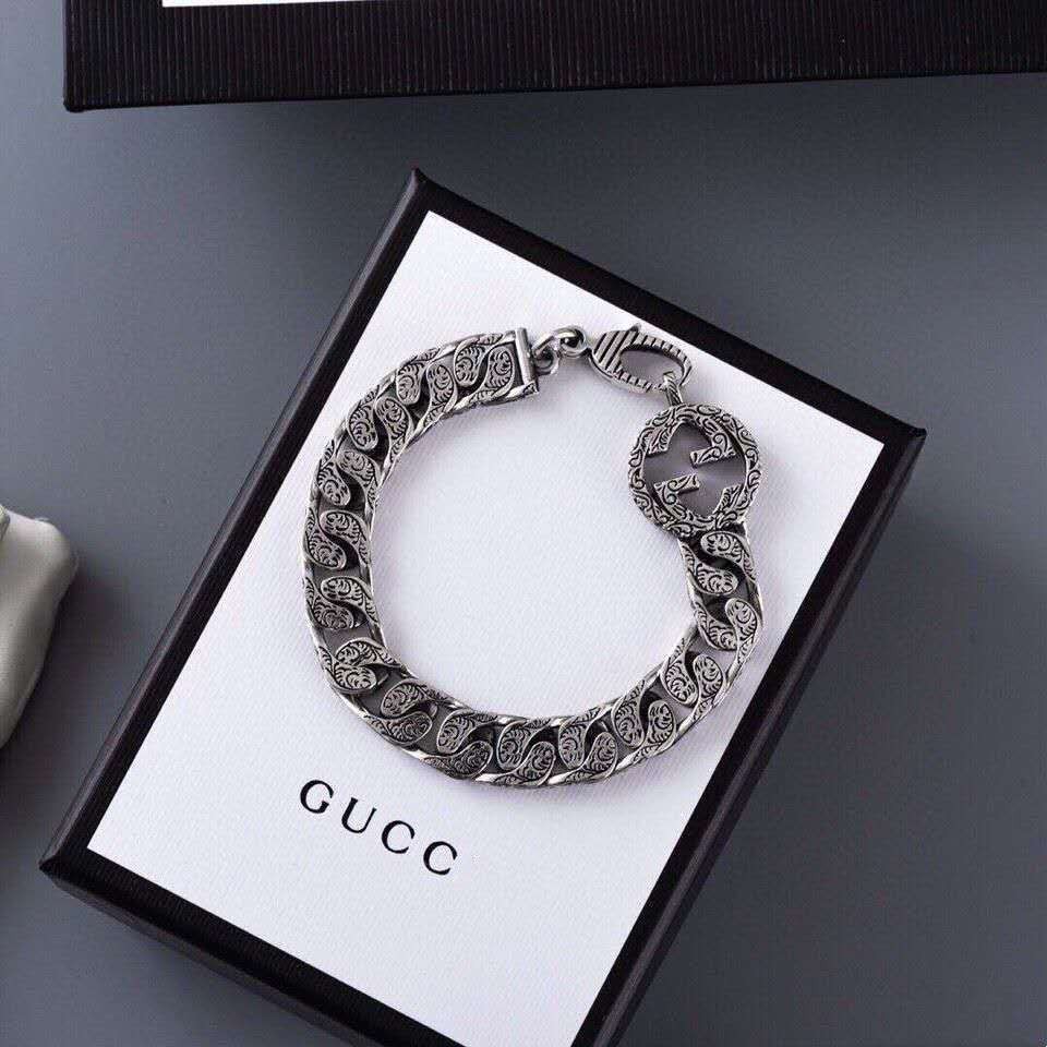 Gucci Retro 925 Silver Double G แกะสลักสร้อยข้อมือกลวงญี่ปุ่นและเกาหลีอารมณ์อเนกประสงค์คู่ชายและหญิ