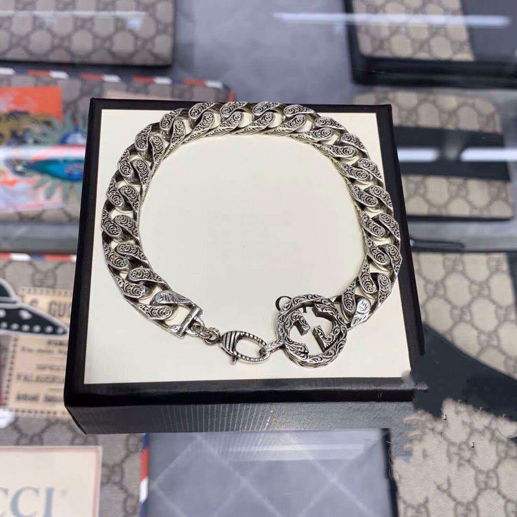 Gucci Retro 925 Silver Double G แกะสลักสร้อยข้อมือกลวงญี่ปุ่นและเกาหลีอารมณ์อเนกประสงค์คู่ชายและหญิง