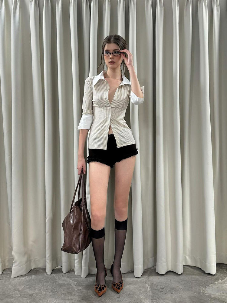 Shanmieleng Niche Design สไตล์เซ็กซี่ผอมลายเสื้อผู้หญิงสไตล์ทุกชนิดของสาวร้อนเอวแคบแขนยาวลดอายุด้านบน
