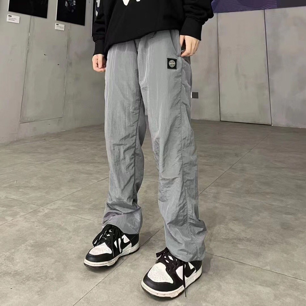 Stone Island ของแท้ 100% กางเกงขายาวลําลอง ผ้าไนล่อน ปักลายโลโก้ สะท้อนแสง แห้งเร็ว เหมาะกับใส่ทําง