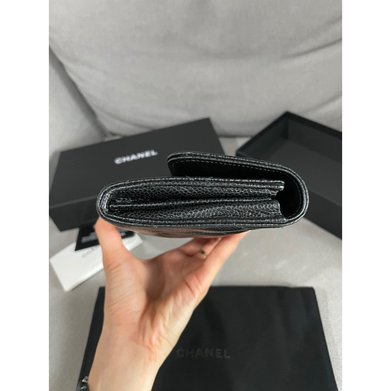 ,Very good con.  Chanel Sarah long wallet