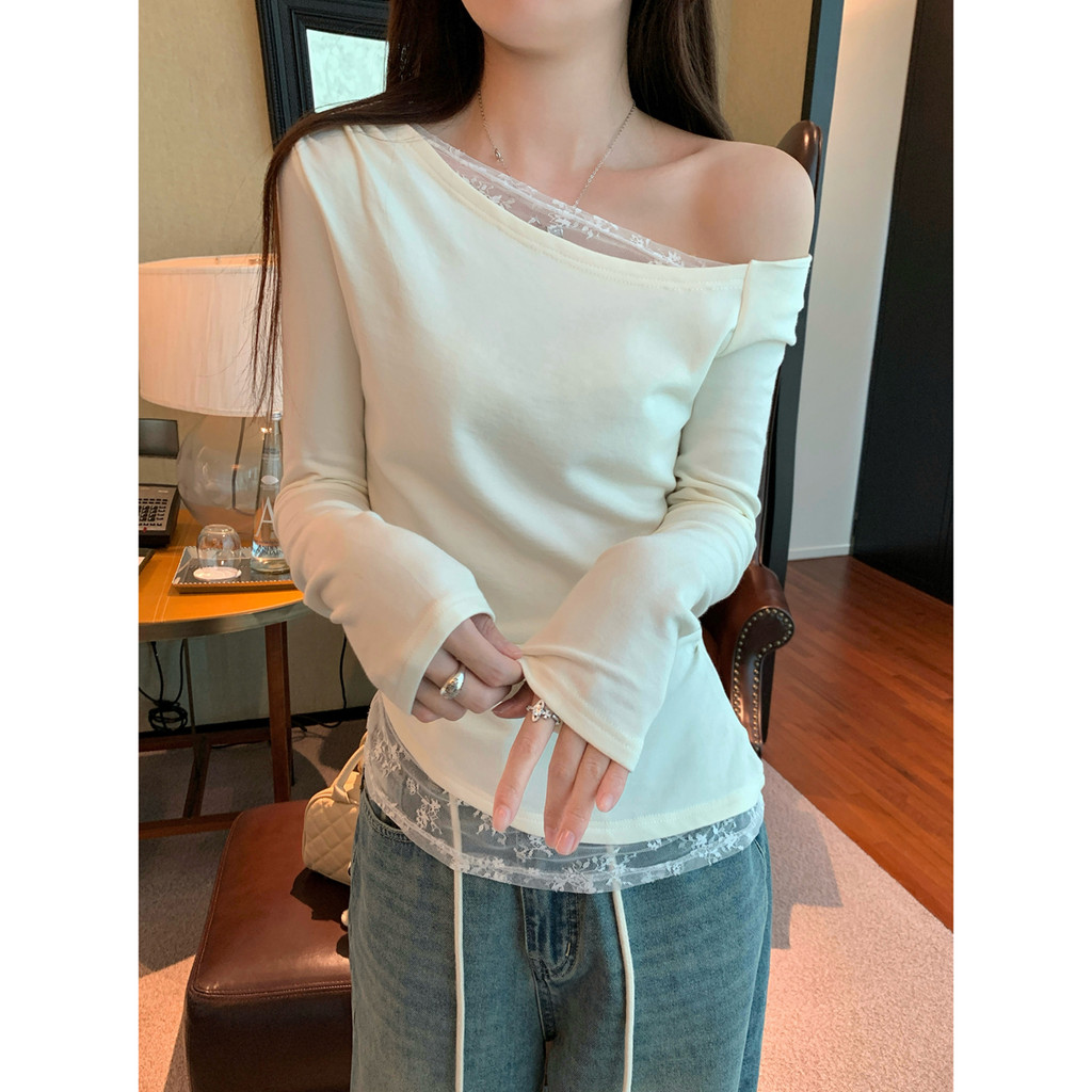 78391 ลูกไม้ไม่สม่ําเสมอเย็บที่ไม่มีสายหนังปกแนวทแยงแขนยาวเสื้อยืด