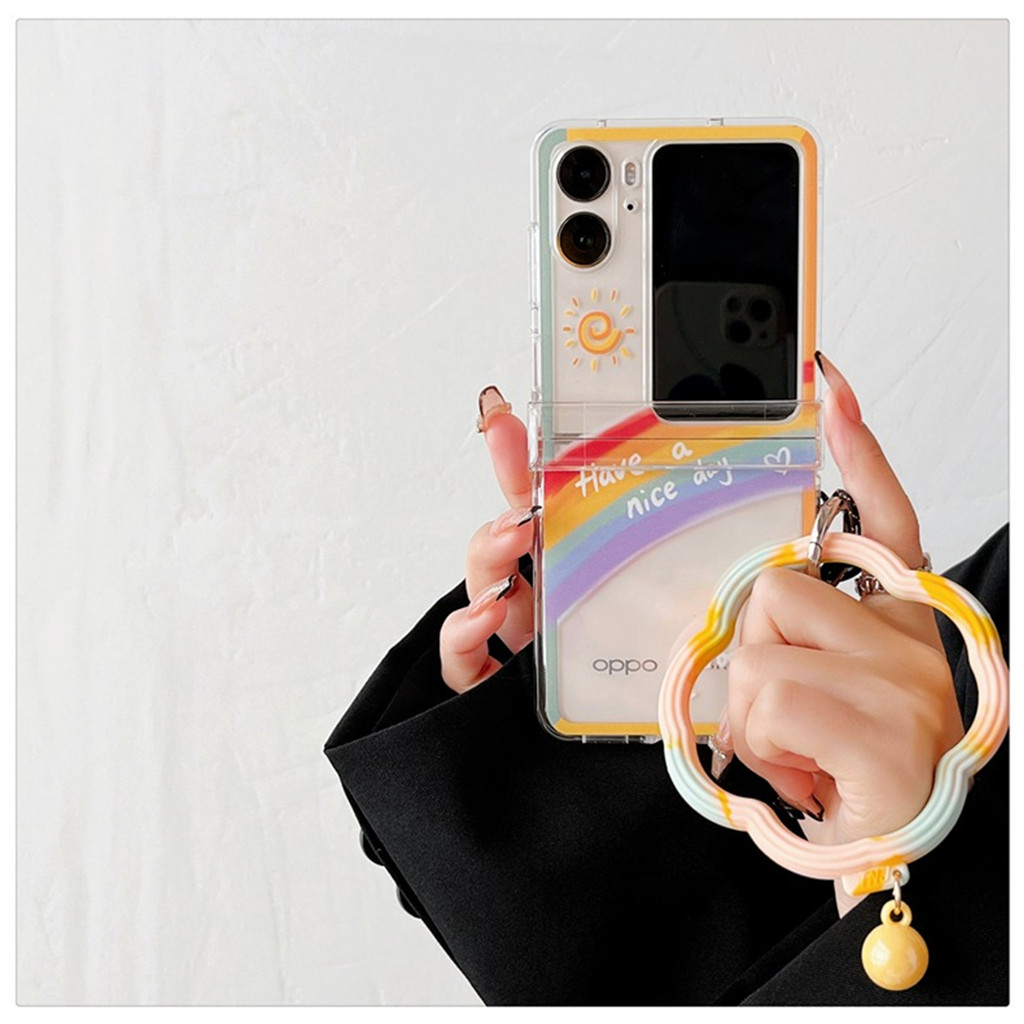 เคสโทรศัพท์โปร่งใสสีรุ้งน่ารักพร้อมสร้อยข้อมือแหวนระฆังไล่โทนสีสําหรับค้นหา N2 Flip N2Flip ค้นหา N3 Flip N3Flip ฝาหลัง