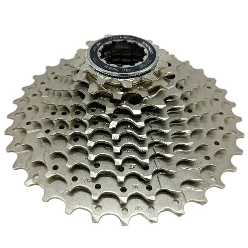 Δ Shimano Deore CS Hg500 10 ความเร็วมู่เล่ Cardboard เฟือง Cs-Hg500 10S 10V