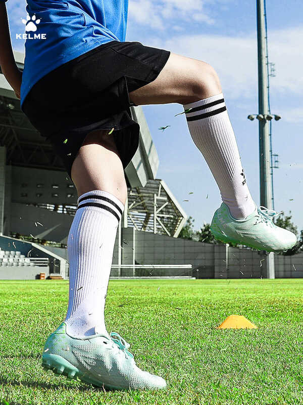 KELME 516 MG ผู้ชายรองเท้าฟุตบอลเยาวชนระบายอากาศเด็กส