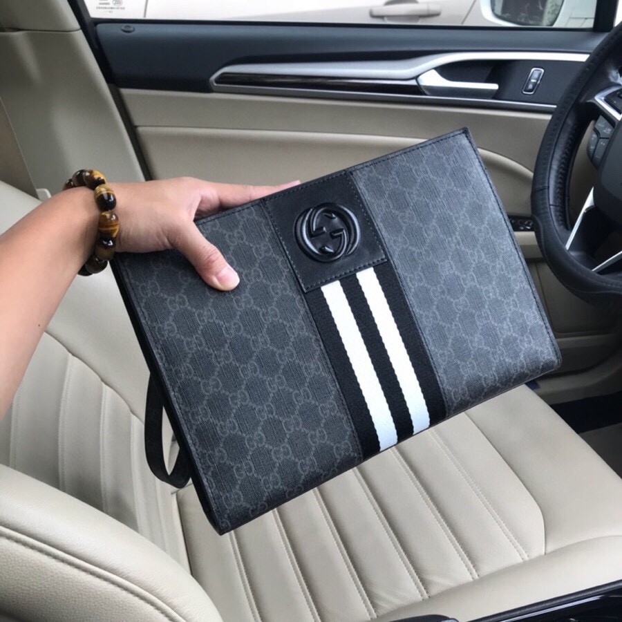 【พร้อมกล่อง+ในสต็อก】 Gucc-i ใหม่ ของแท้ 100% กระเป๋าถือผู้ชาย GG โลโก้หนัง ซิป กระเป๋าแฟ้มธุรกิจ