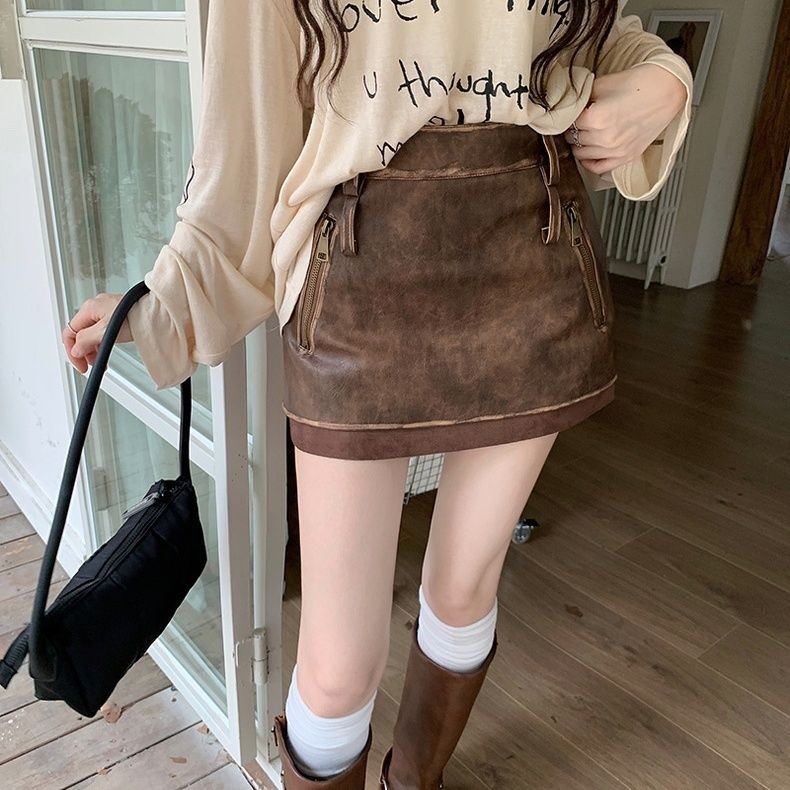 กระโปรงหนัง pu สีดําย้อนยุคอเมริกันเอวสูง a-Line Hip Wrap