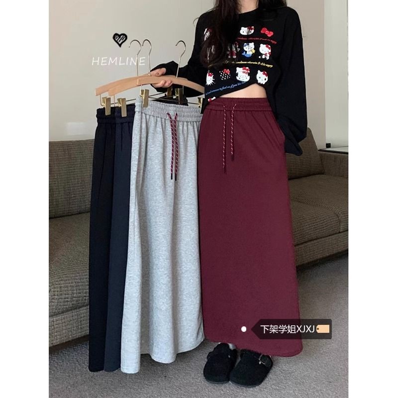 เสื้อสเวตเตอร์เชือกรูดเวอร์ชั่นเกาหลีสไตล์ใหม่ยืดหยุ่นเอวสูงครึ่งความยาว A-Line