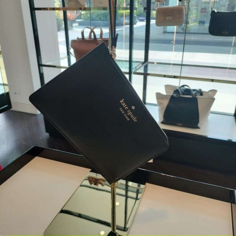 กระเป๋าสตางค์หิ้ว Kade Spade
