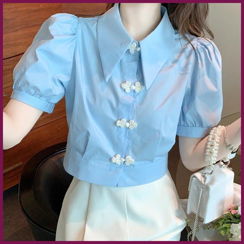 เสื้อเชิ้ตสีฟ้าแขนพองเนื้อผ้าชีฟองรัดเอวสไตล์ญี่ปุ่นน่ารักฤดูร้อน2025 – โปรปัง