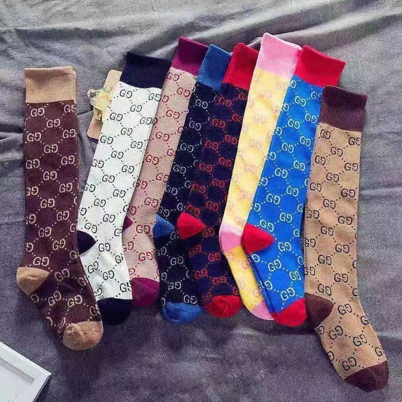 Gucci Double G Letter อินเทอร์เน็ตคนดังสไตล์หลอดยาวสีตัดกันถุงเท้าอินเทรนด์ฤดูใบไม้ผลิและฤดูใบไม้ร่วงสไตล์ญี่ปุ่น Co