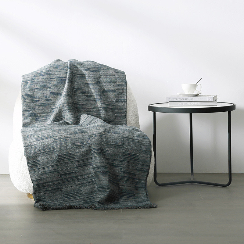 Modern minimalist blue grey pure hemp jacquard bed, towel and blanket at the end of the bed, living 