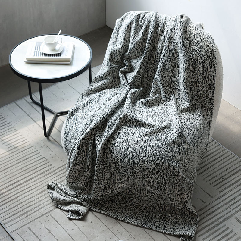 Modern minimalist black and white wool tail blanket sofa bed, homestay hotel model room, soft decora